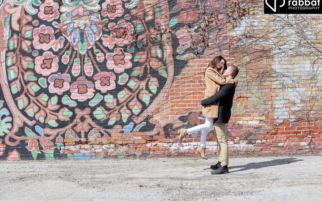 Engagement Photos in front of mural in Liberty Village